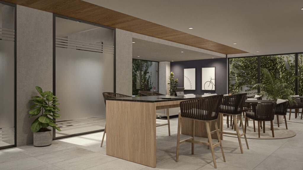 Espacio de co working con mesas altas y sillas